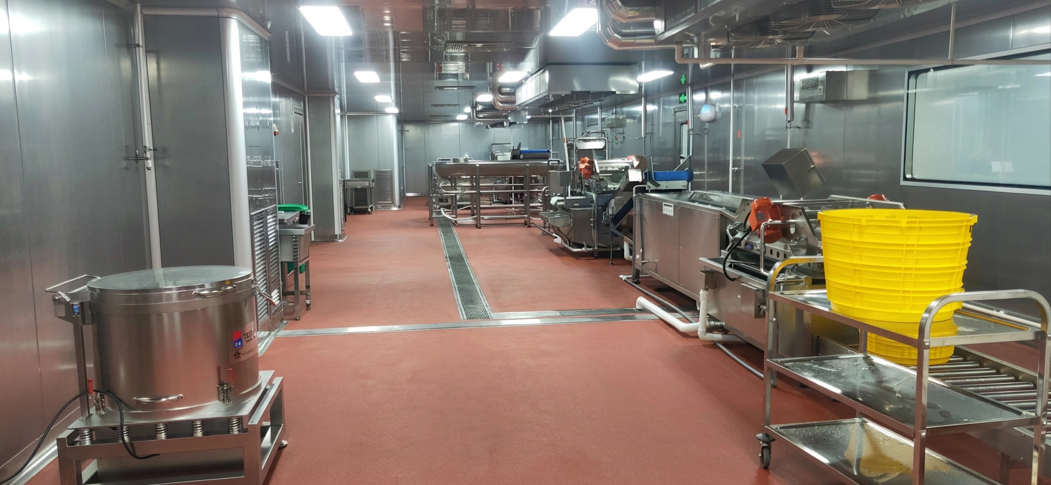 Catering production area designed for organized central food preparation workflow