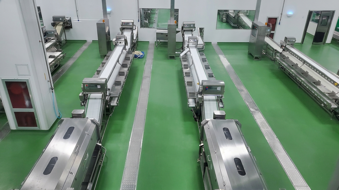 Parallel processing lanes showing controlled movement through a hygienic food preparation facility