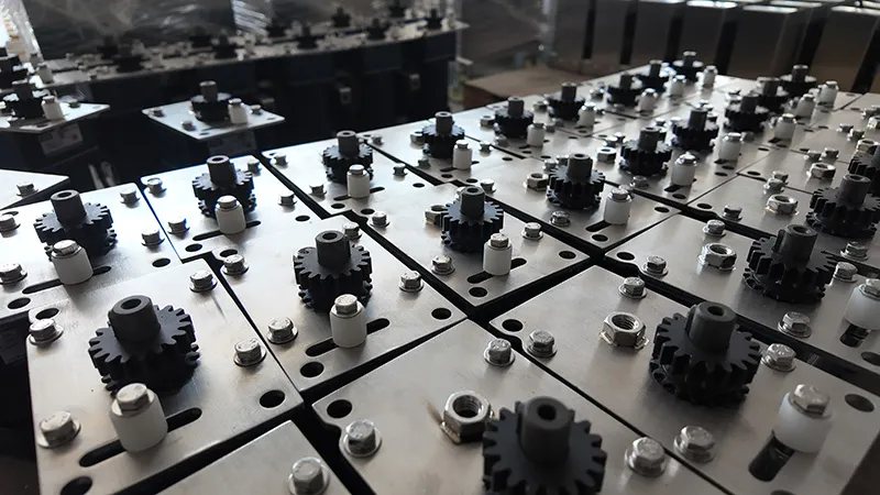 Precision stainless steel components prepared for sanitary food processing machine assembly