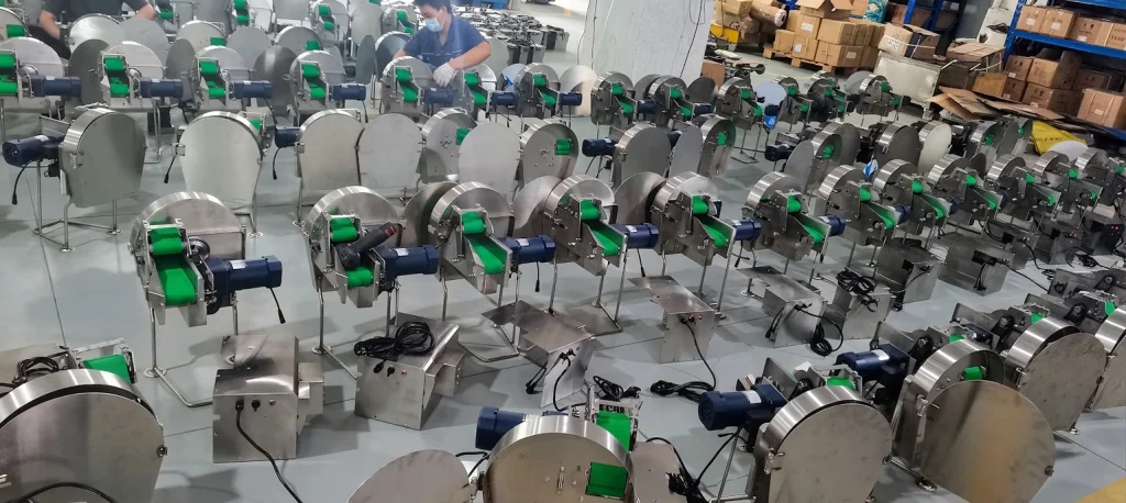 Technicians assembling processing-machine components in the workshop