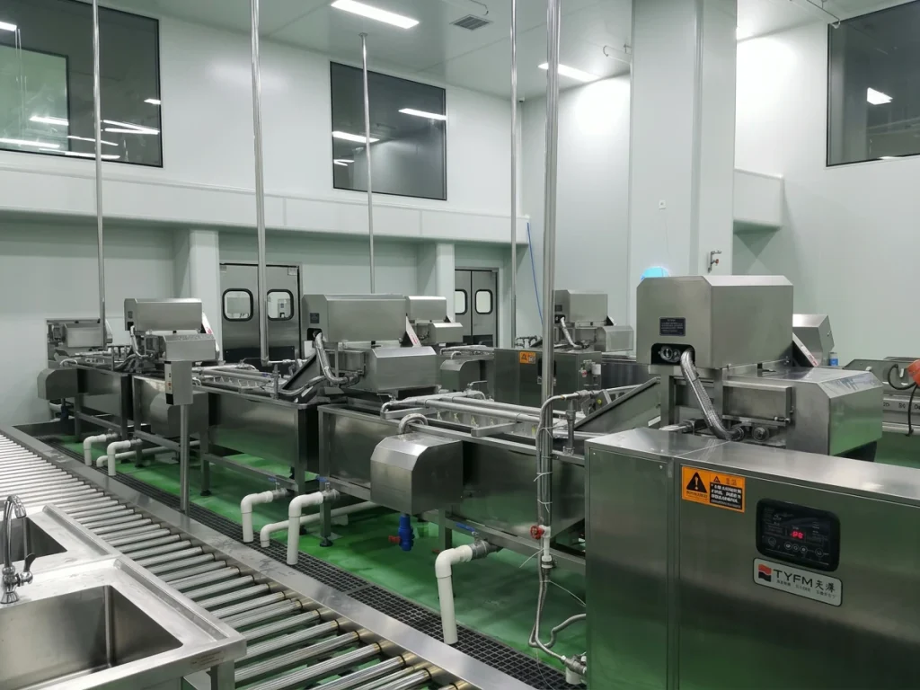Food preparation line for central kitchen and fresh-cut processing operations