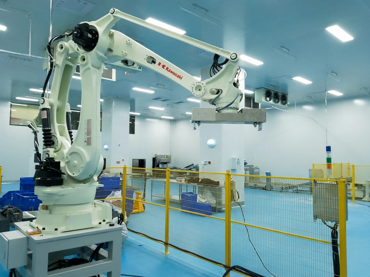 Industrial robot installed inside a hygienic automated food processing facility
